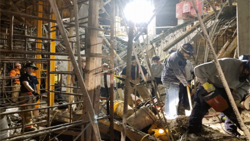 The search continues early Tuesday for a worker missing in a partial building collapse on...
