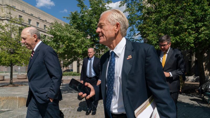 Former White House trade adviser Peter Navarro leaves federal court in Washington, following a...
