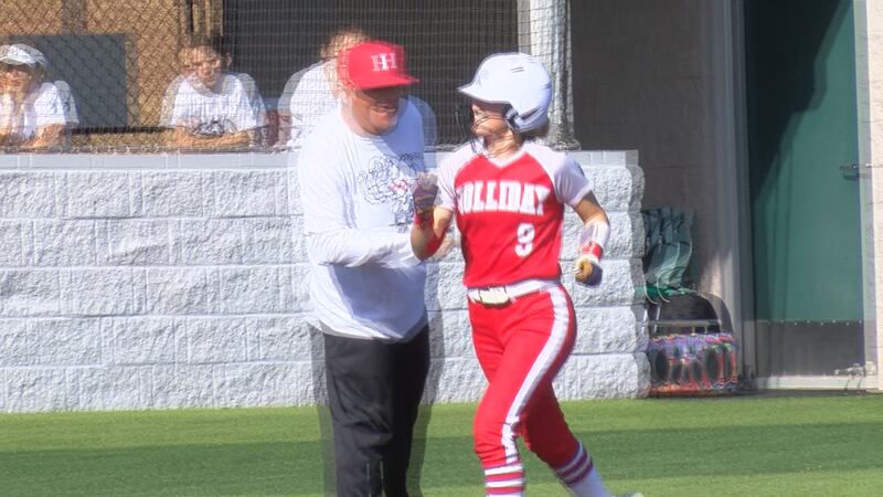 Carissa Griffin (9) celebrates after solo home run.